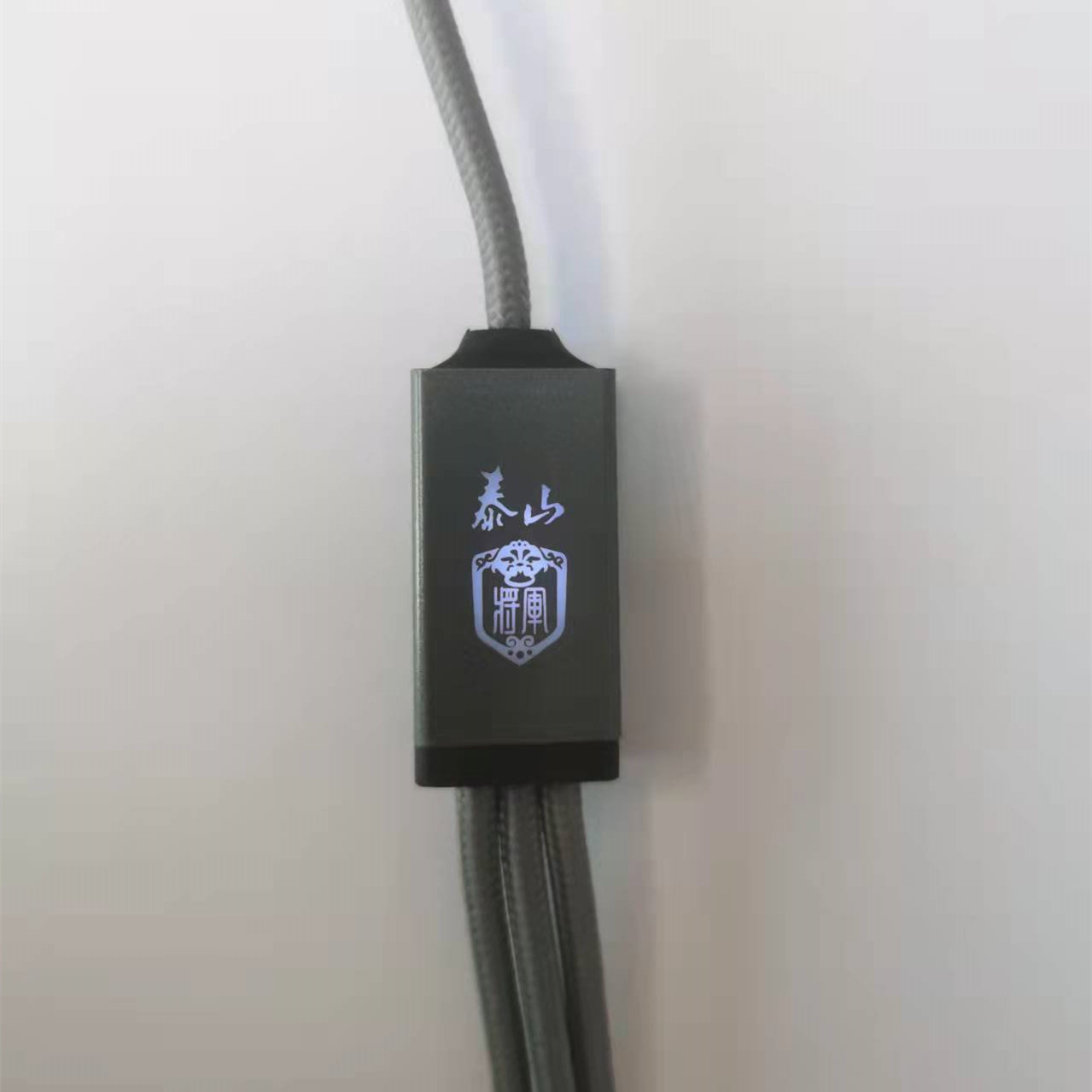 One-driven three-braided luminous charging cable